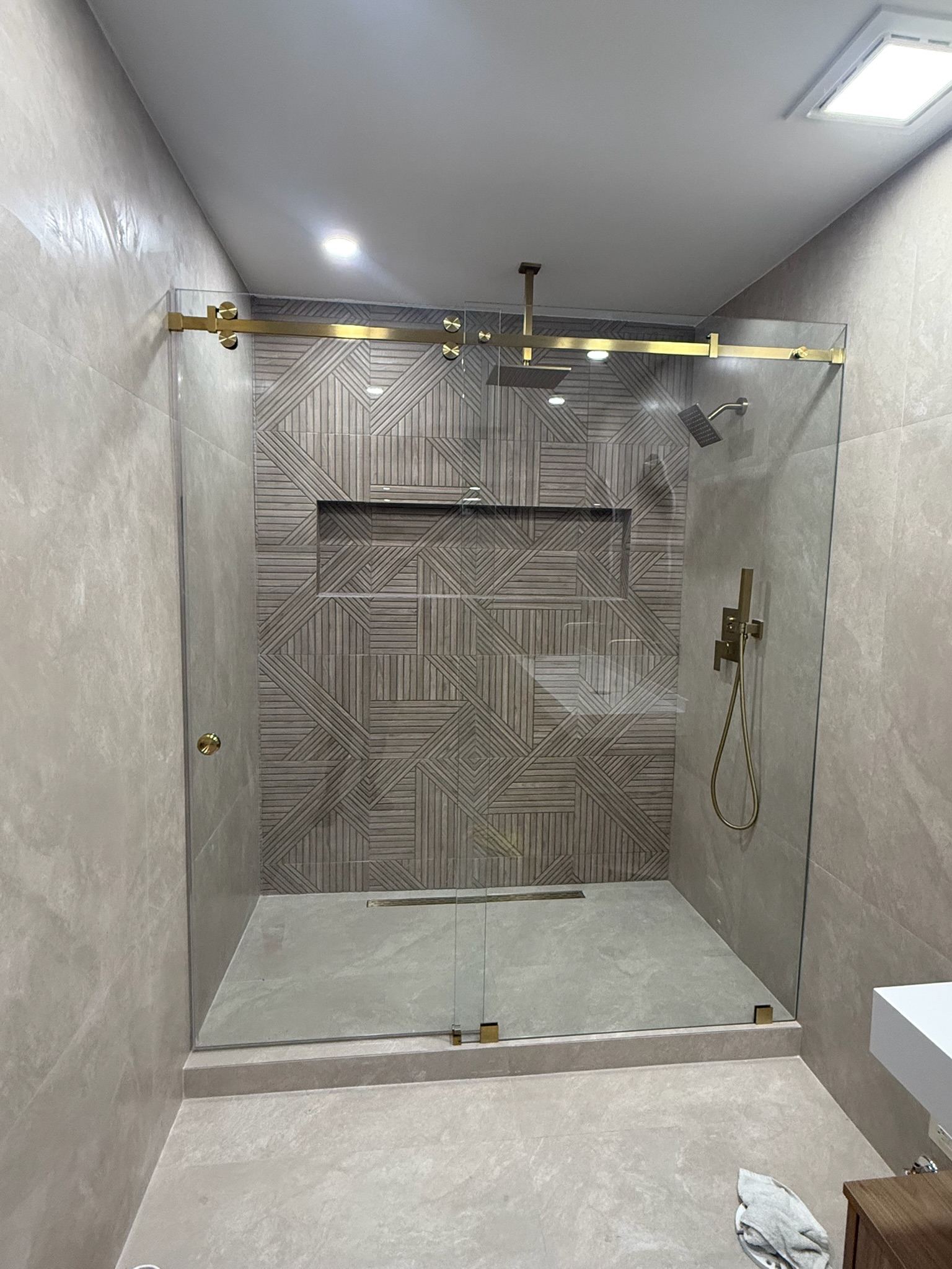 Geometric Accent Shower project by Worldwide Floors Corp in Miami-Dade or Broward