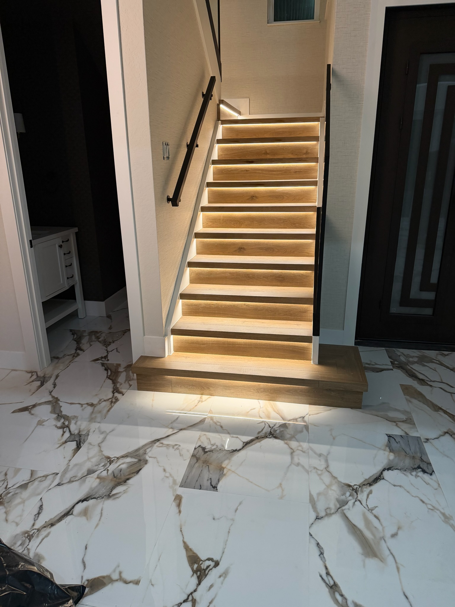 LED Stairs & Marble Foyer project by Worldwide Floors Corp in Miami-Dade or Broward