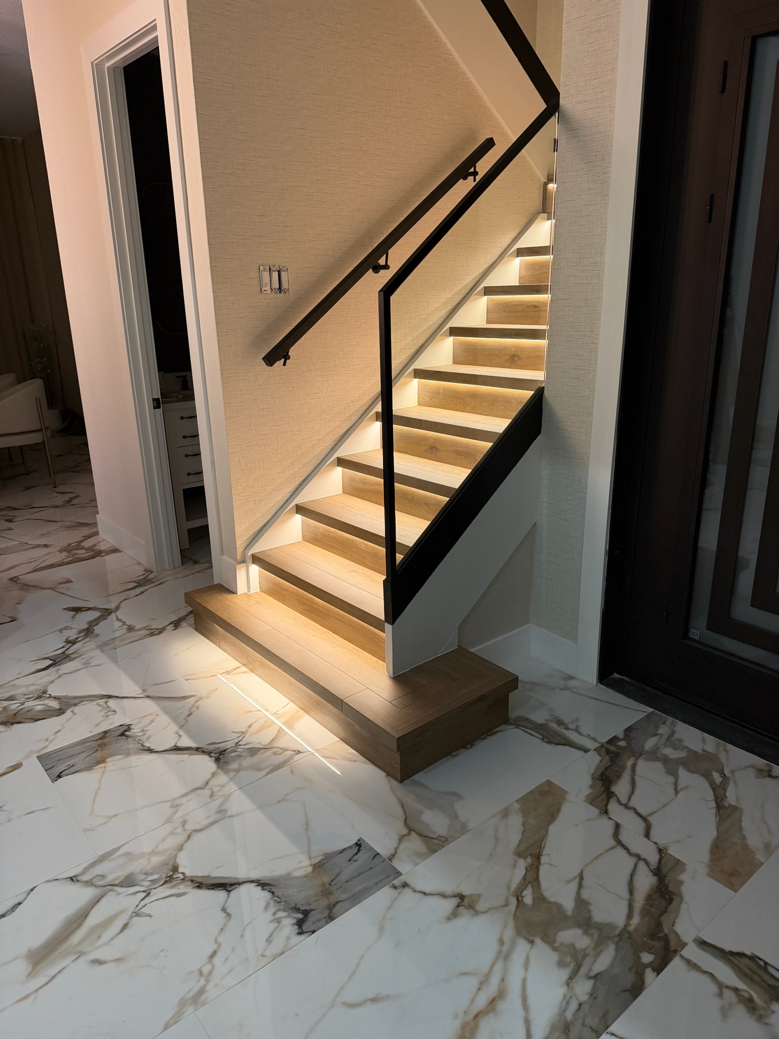 LED Stairs & Glass Railing project by Worldwide Floors Corp in Miami-Dade or Broward