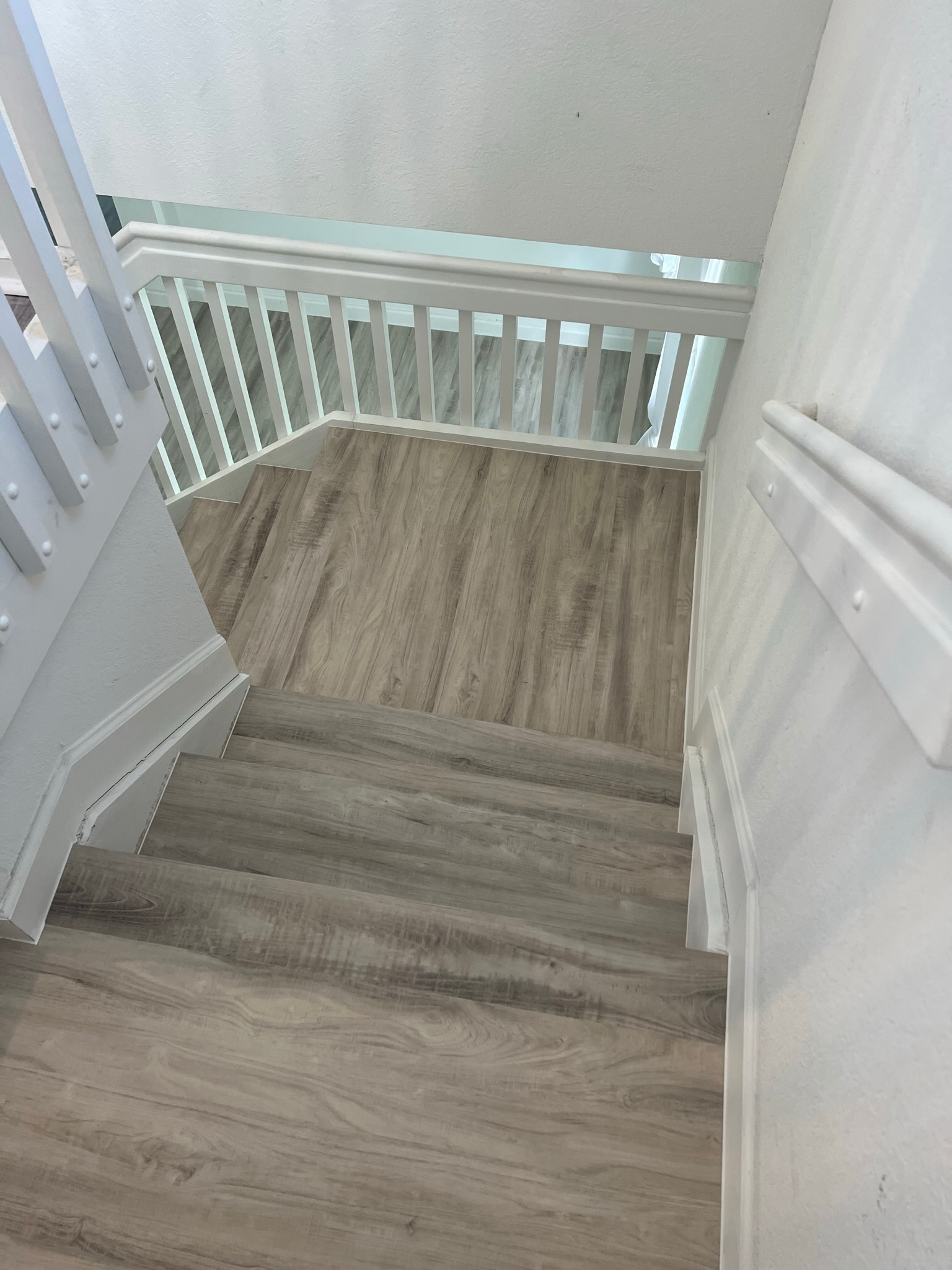 LVP Stairs & Landing project by Worldwide Floors Corp in Miami-Dade or Broward
