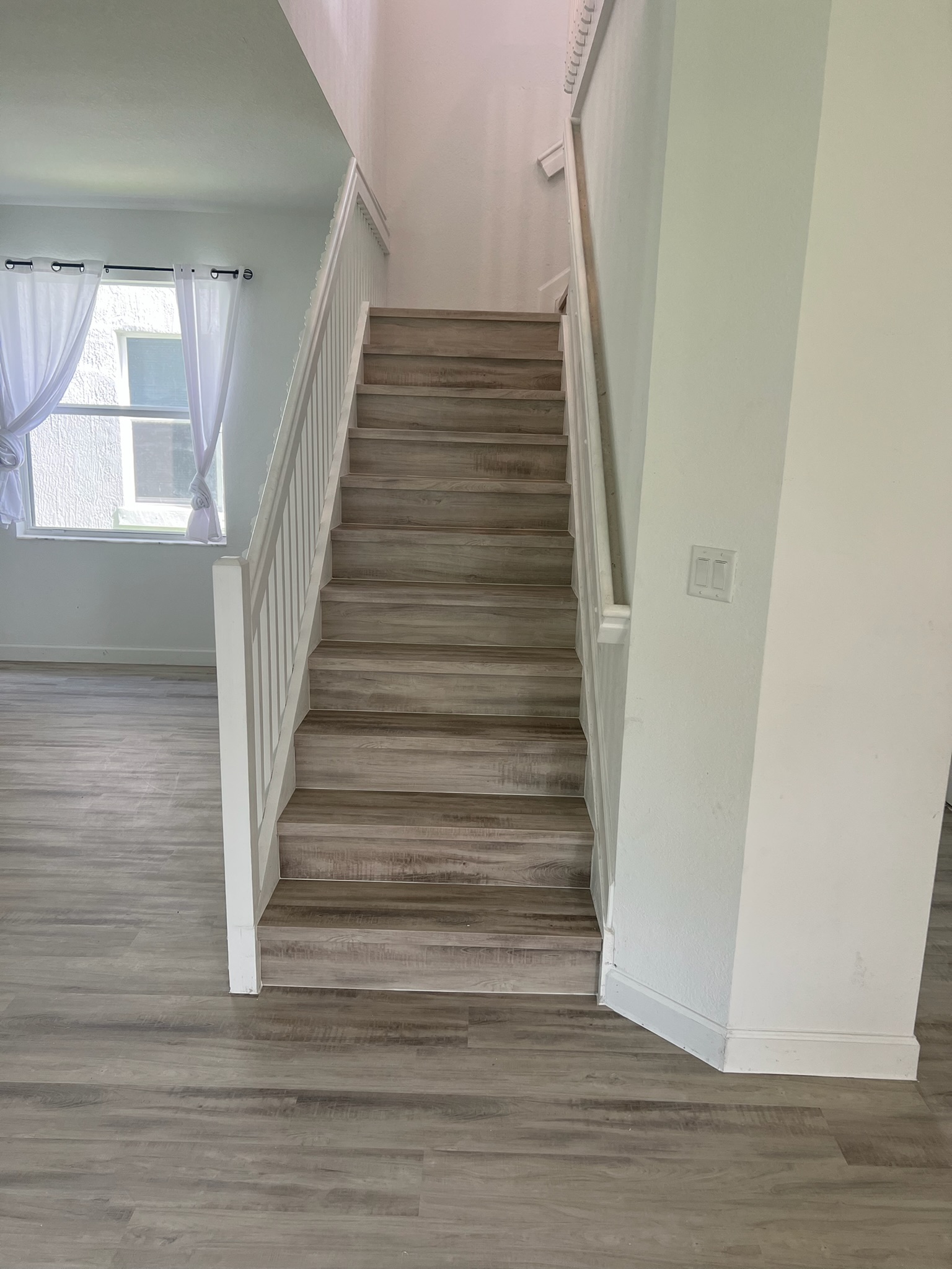 LVP Stair Treads project by Worldwide Floors Corp in Miami-Dade or Broward
