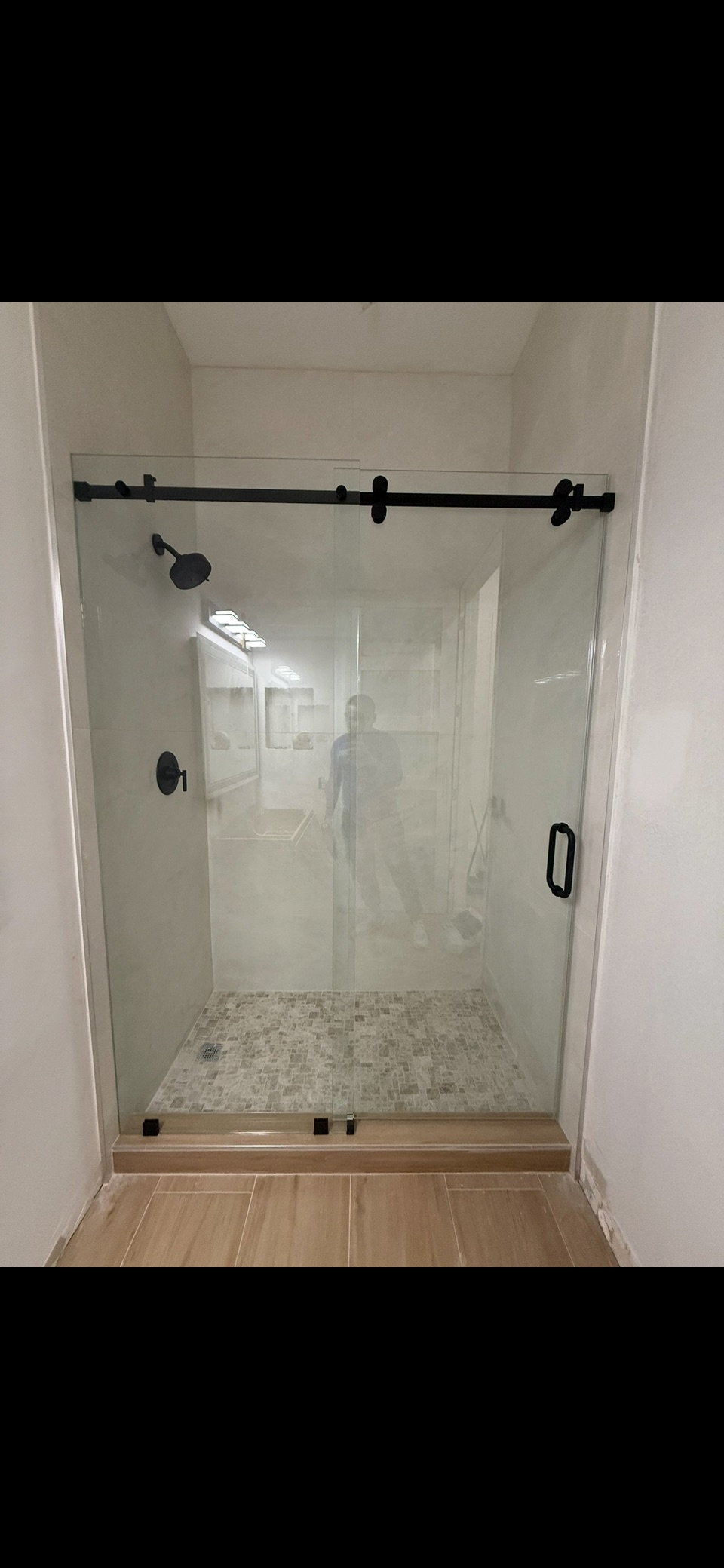 Glass Shower & Black Hardware project by Worldwide Floors Corp in Miami-Dade or Broward
