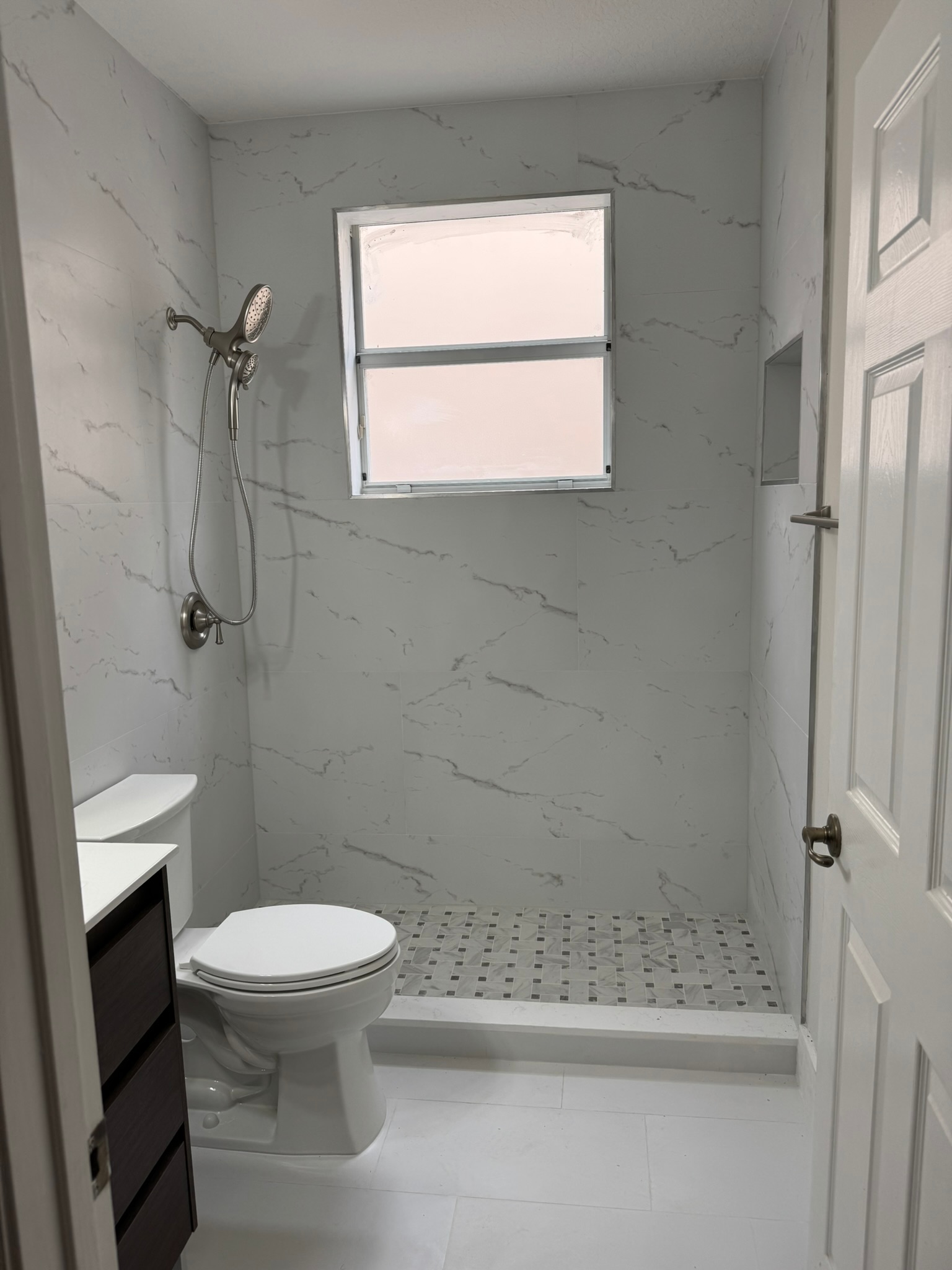 Walk-In Shower & Mosaic Floor project by Worldwide Floors Corp in Miami-Dade or Broward