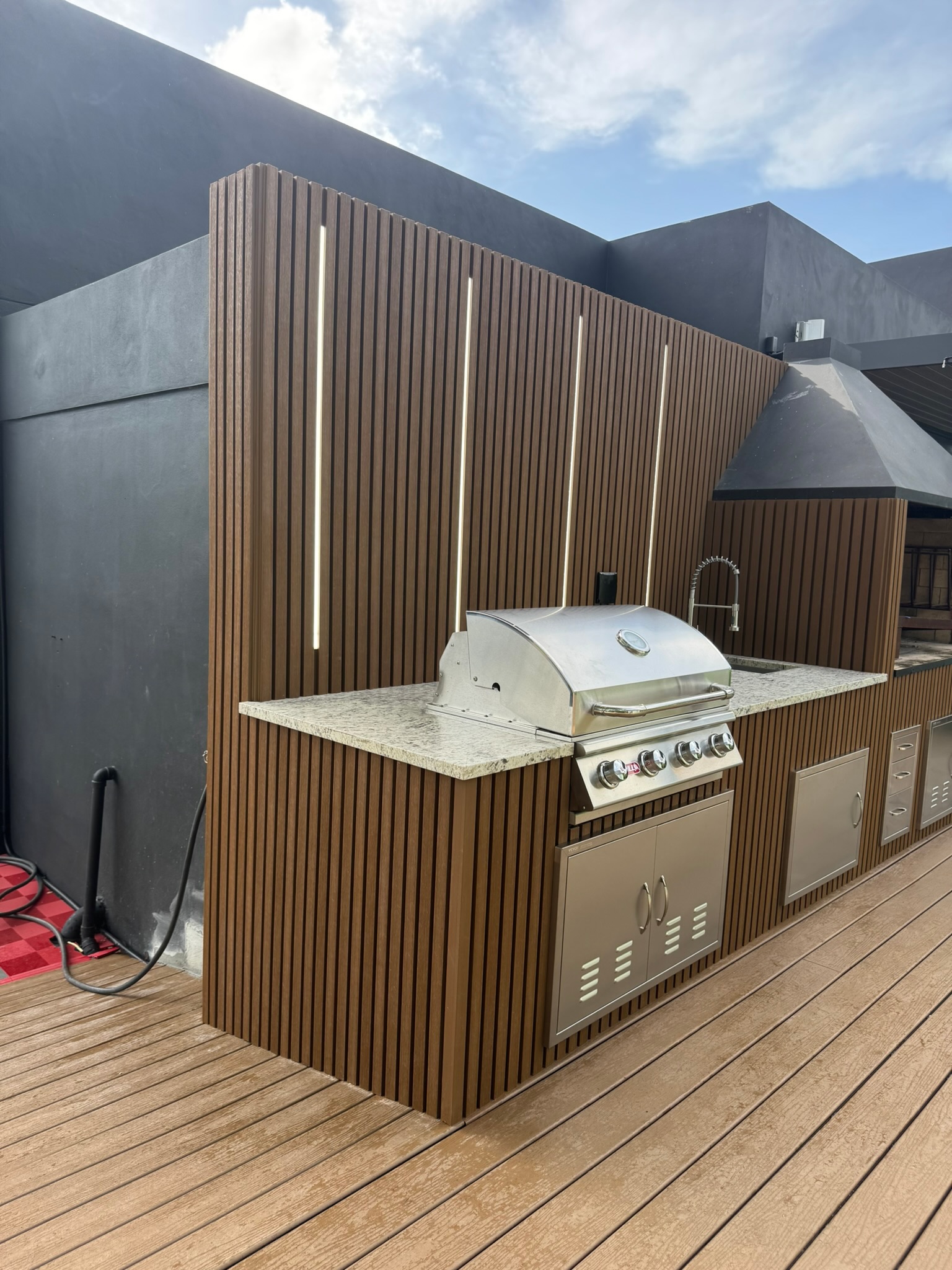 Outdoor Kitchen & Deck project by Worldwide Floors Corp in Miami-Dade or Broward