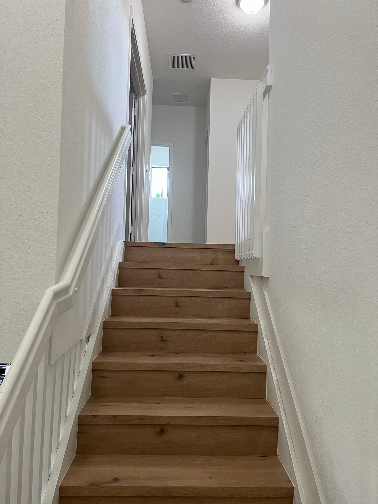 Hallway Stair Treads project by Worldwide Floors Corp in Miami-Dade or Broward