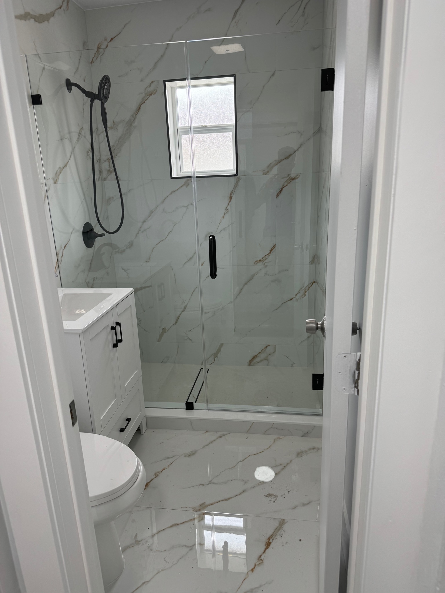Calacatta Marble Bathroom project by Worldwide Floors Corp in Miami-Dade or Broward